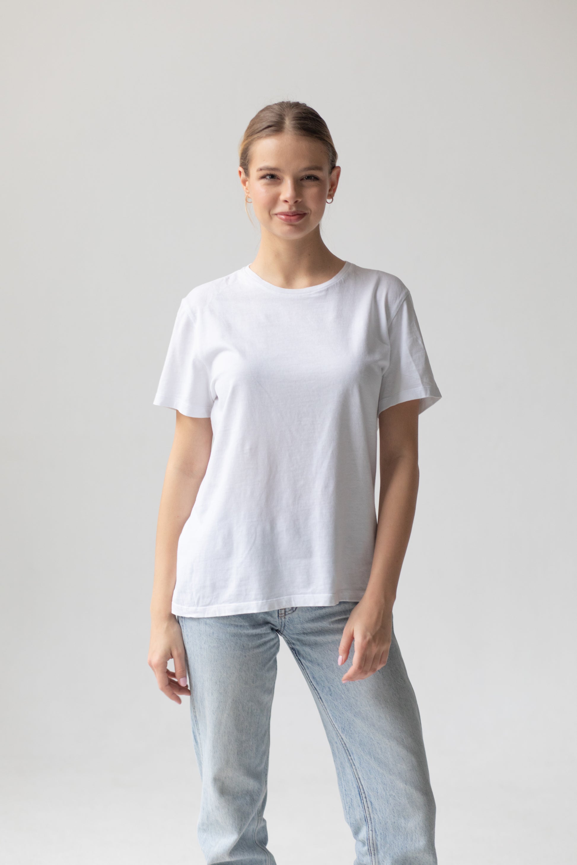 Women's White Tee and Light Wash Denim Jeans Outfit | Casual Style